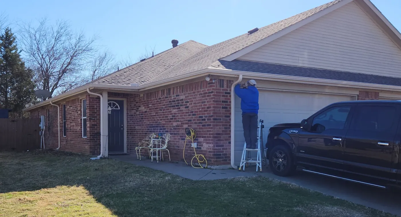 Beacon Rain Control technician installing seamless gutters